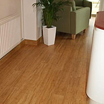 A Matt Finish Strand Woven Bamboo with Solid Bamboo Skirting